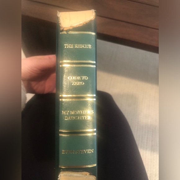 Anthropologie: Hand cut letters from Reader’s Digest books. Spells out “HOME.” - Picture 8 of 15